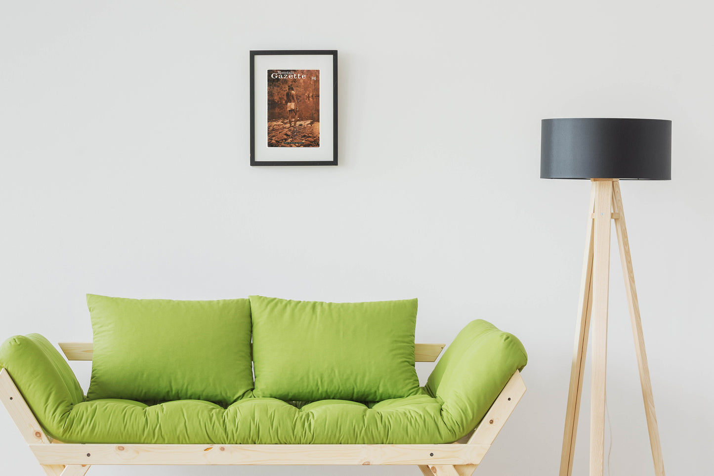 Issue 86 cover art shown hung and framed on a white wall