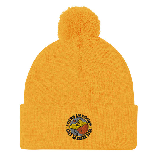 Warm and stylish pom-pom beanie with stitched mountain-themed logo