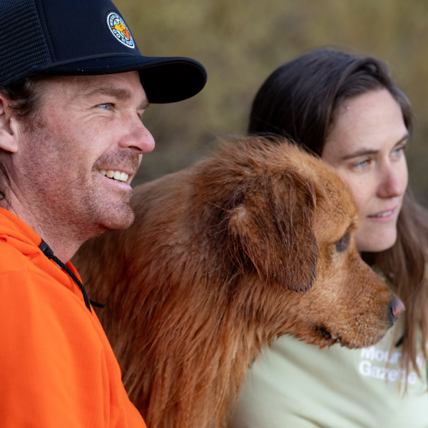 Male and female models wearing the Mountain Gazette x Burgeon Outdoor Hooded Sweatshirt