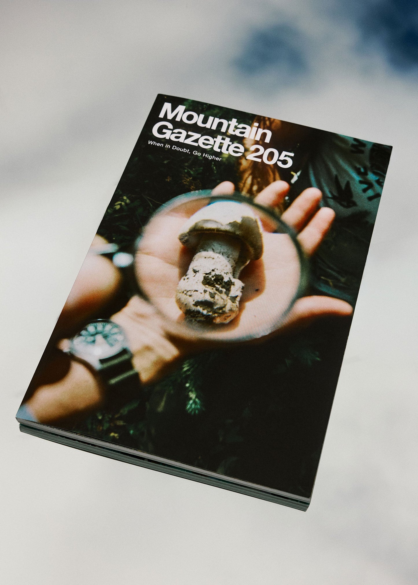 Magazine titled 'Mountain Gazette 205' on a textured surface