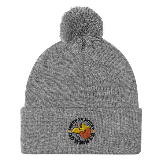 Warm and stylish pom-pom beanie with stitched mountain-themed logo